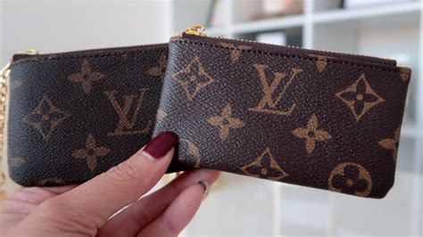 how to spot a fake louis vuitton key pouch|louis vuitton empreinte key pouch.